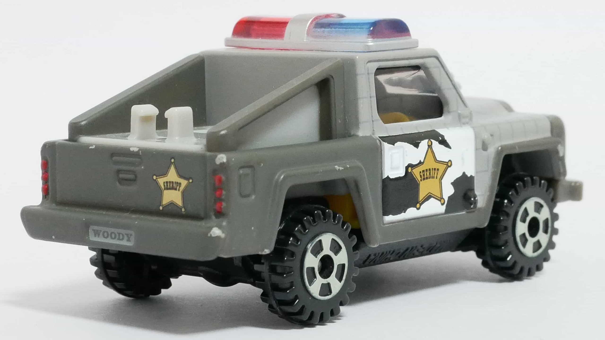 ディズニーモータースワークスDM-14_エクスクルーザーパトロールカーウッディ_後